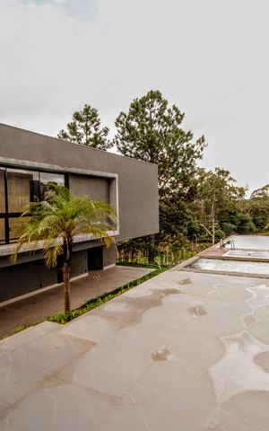 Casa de condomínio à venda com 403m², 4 quartos e 4 vagasfachada
