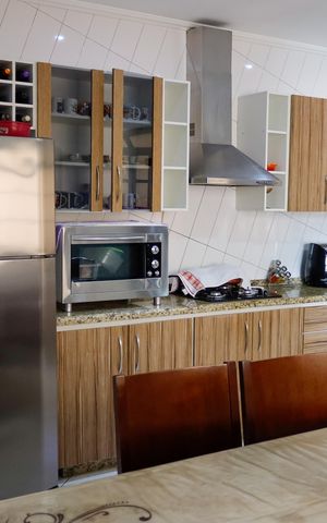 Casa à venda com 150m², 3 quartos e 2 vagas Casa à venda com 150m², 3 quartos e 2 vagasCozinha