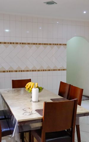 Casa à venda com 150m², 3 quartos e 2 vagas Casa à venda com 150m², 3 quartos e 2 vagasCozinha