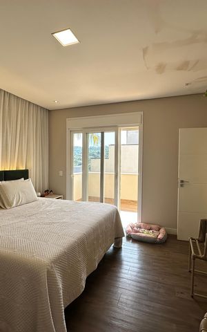 Casa de condomínio para alugar com 472m², 4 quartos e 4 vagasSuíte 1