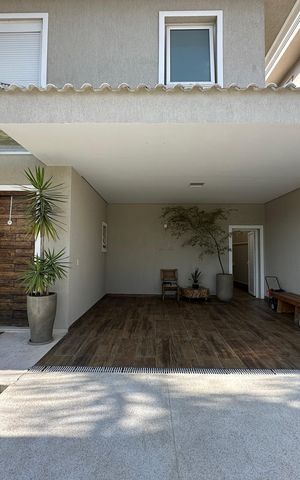 Casa de condomínio para alugar com 472m², 4 quartos e 4 vagasGaragem