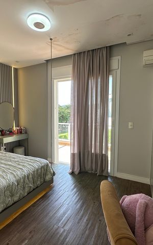 Casa de condomínio para alugar com 472m², 4 quartos e 4 vagasSuíte 2