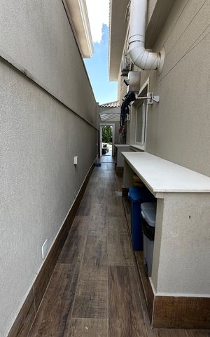 Casa de condomínio para alugar com 472m², 4 quartos e 4 vagasQuintal