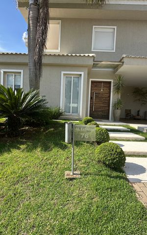 Casa de condomínio para alugar com 472m², 4 quartos e 4 vagasFachada