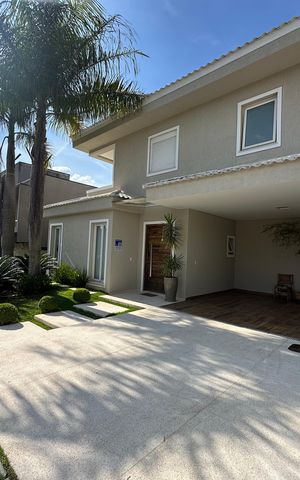 Casa de condomínio para alugar com 472m², 4 quartos e 4 vagasFachada
