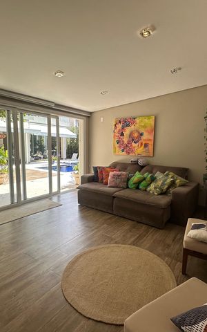 Casa de condomínio para alugar com 472m², 4 quartos e 4 vagasSala de TV