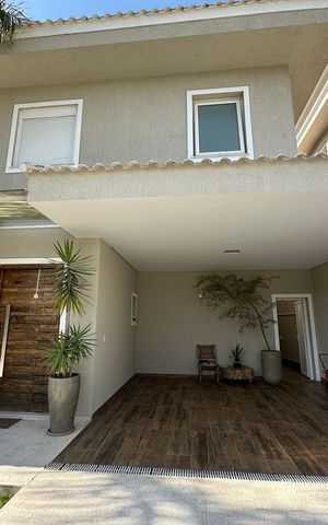 Casa de condomínio para alugar com 472m², 4 quartos e 4 vagasGaragem
