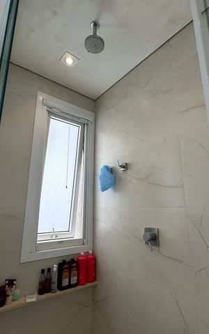 Casa de condomínio para alugar com 472m², 4 quartos e 4 vagasBanheiro da Suíte 1