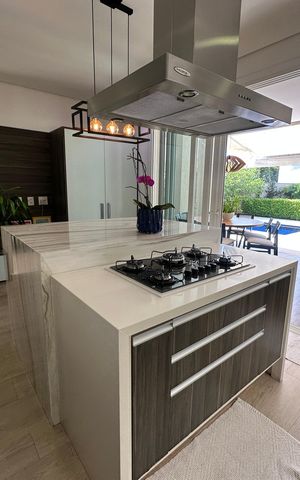 Casa de condomínio para alugar com 472m², 4 quartos e 4 vagasCozinha