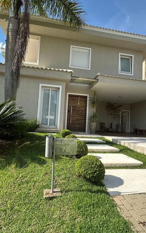 Casa de condomínio para alugar com 472m², 4 quartos e 4 vagasFachada