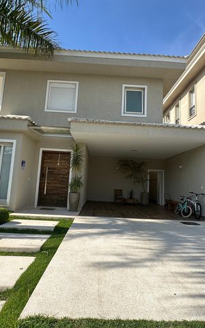 Casa de condomínio para alugar com 472m², 4 quartos e 4 vagasFachada