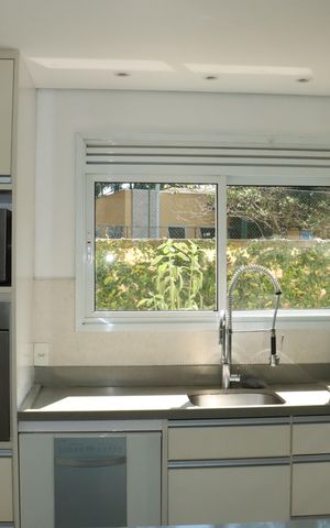 Casa de condomínio para alugar com 295m², 4 quartos e 4 vagasCozinha