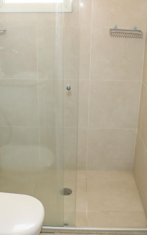 Casa de condomínio para alugar com 295m², 4 quartos e 4 vagasBanheiro da Suíte 2
