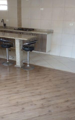 Casa à venda com 260m², 4 quartos e 2 vagas Casa à venda com 260m², 4 quartos e 2 vagasCozinha