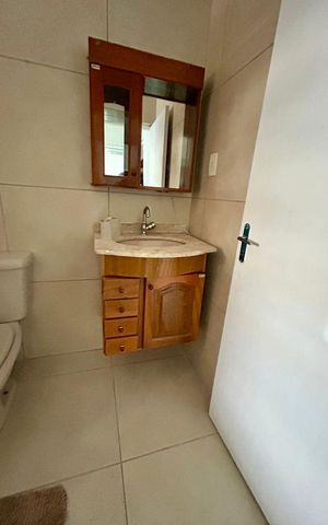 Casa à venda com 209m², 4 quartos e 2 vagas Casa à venda com 209m², 4 quartos e 2 vagasBanheiro