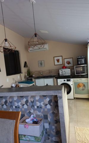 Casa à venda com 80m², 3 quartos e sem vaga Casa à venda com 80m², 3 quartos e sem vagaCozinha