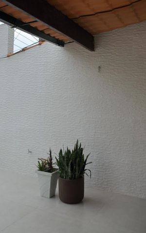 Casa à venda com 160m², 3 quartos e 2 vagasSuíte 2 - Varanda 