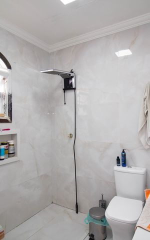 Casa de condomínio para alugar com 150m², 3 quartos e 5 vagasBanheiro da Suíte 3