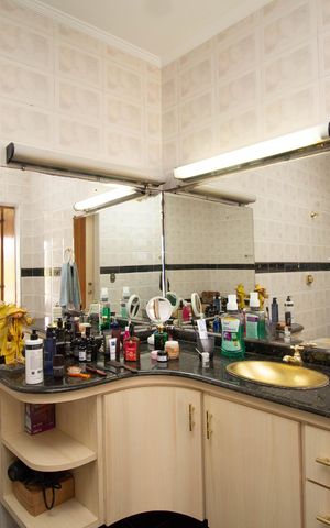 Casa de condomínio para alugar com 150m², 3 quartos e 5 vagasBanheiro da Suíte 1
