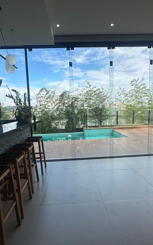 Casa de condomínio à venda com 343m², 4 quartos e 6 vagas Casa de condomínio à venda com 343m², 4 quartos e 6 vagasChurrasqueira