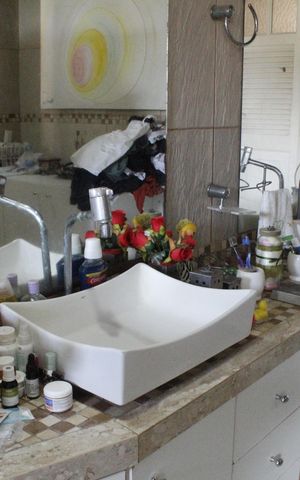 Casa de condomínio para alugar com 200m², 4 quartos e 5 vagasBanheiro da Suíte 1