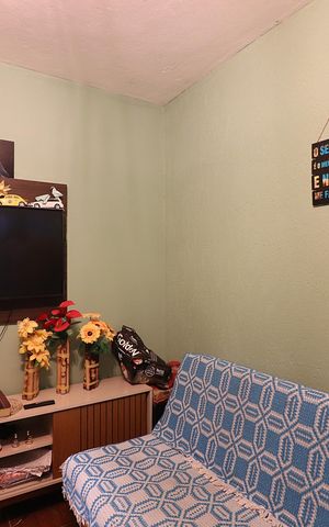 Casa à venda com 100m², 2 quartos e 2 vagasSala 