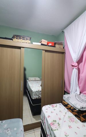 Casa à venda com 100m², 2 quartos e 2 vagasQuarto 2