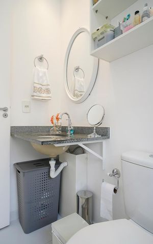 Apartamento à venda com 64m², 2 quartos e 2 vagasBanheiro da suíte