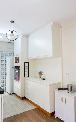 Casa à venda com 130m², 3 quartos e 3 vagas Casa à venda com 130m², 3 quartos e 3 vagasCozinha