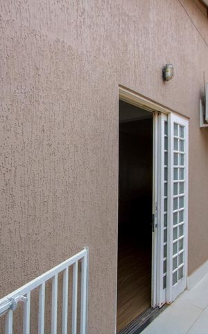 Casa à venda com 130m², 3 quartos e 3 vagas Casa à venda com 130m², 3 quartos e 3 vagasCorredor externo
