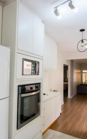 Casa à venda com 130m², 3 quartos e 3 vagas Casa à venda com 130m², 3 quartos e 3 vagasCozinha
