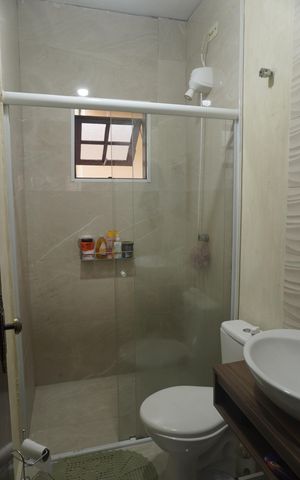 Casa de condomínio à venda com 108m², 3 quartos e 2 vagas Casa de condomínio à venda com 108m², 3 quartos e 2 vagasBanheiro