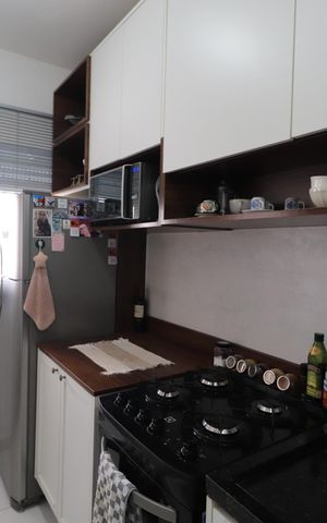 Apartamento à venda com 58m², 2 quartos e 1 vagaCozinha e Área de Serviço