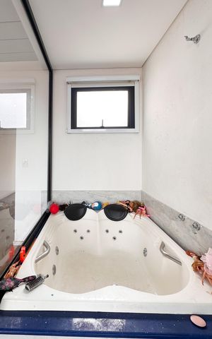 Casa à venda com 166m², 3 quartos e 3 vagasBanheiro da Suíte 2