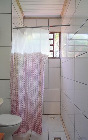 Casa à venda com 132m², 3 quartos e 2 vagasBanheiro 1