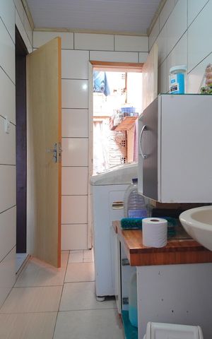 Casa à venda com 132m², 3 quartos e 2 vagasBanheiro 1
