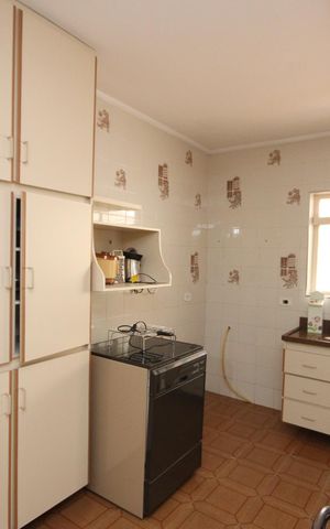 Casa à venda com 160m², 4 quartos e 2 vagas Casa à venda com 160m², 4 quartos e 2 vagasCozinha
