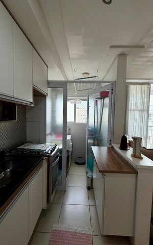 Apartamento à venda com 46m², 2 quartos e 1 vaga Apartamento à venda com 46m², 2 quartos e 1 vagaCozinha e Área de Serviço