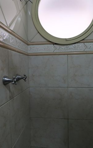 Casa de condomínio para alugar com 450m², 4 quartos e 6 vagasBanheiro da Suíte 1
