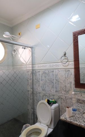 Casa de condomínio para alugar com 450m², 4 quartos e 6 vagasBanheiro da Suíte 3