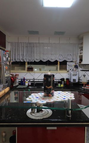 Casa de condomínio para alugar com 450m², 4 quartos e 6 vagasCozinha