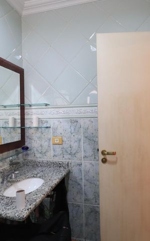 Casa de condomínio para alugar com 450m², 4 quartos e 6 vagasBanheiro da Suíte 3