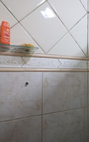 Casa de condomínio para alugar com 450m², 4 quartos e 6 vagasBanheiro da Suíte 1