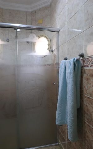 Casa de condomínio para alugar com 450m², 4 quartos e 6 vagasBanheiro da Suíte 2