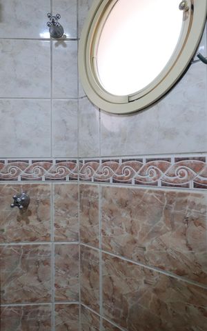 Casa de condomínio para alugar com 450m², 4 quartos e 6 vagasBanheiro da Suíte 2