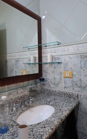 Casa de condomínio para alugar com 450m², 4 quartos e 6 vagasBanheiro da Suíte 3