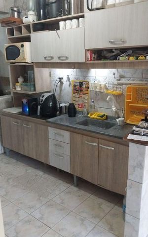 Casa de condomínio à venda com 60m², 2 quartos e 2 vagas Casa de condomínio à venda com 60m², 2 quartos e 2 vagasCozinha