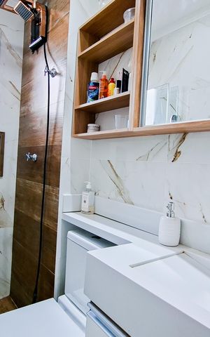 Apartamento à venda com 61m², 2 quartos e 2 vagasBanheiro da Suíte