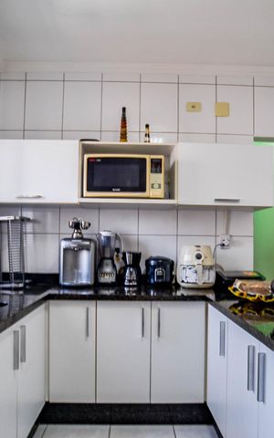 Apartamento à venda com 100m², 2 quartos e 2 vagas Apartamento à venda com 100m², 2 quartos e 2 vagasCozinha e Área de Serviço