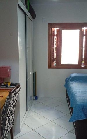 Casa à venda com 50m², 2 quartos e 1 vaga Casa à venda com 50m², 2 quartos e 1 vagaQuarto 1